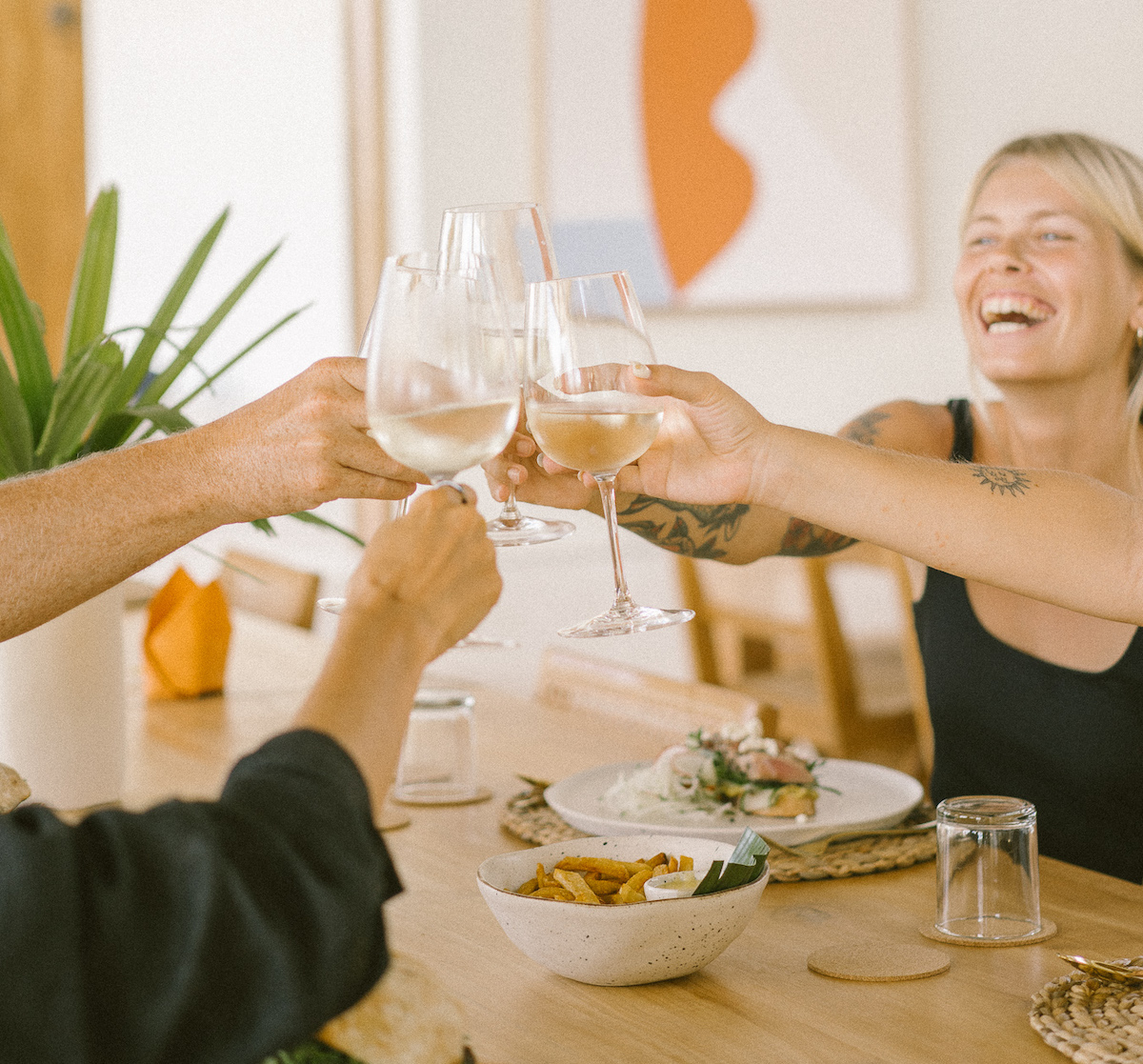 Women with wine at the surf & yoga retreat in Lombok