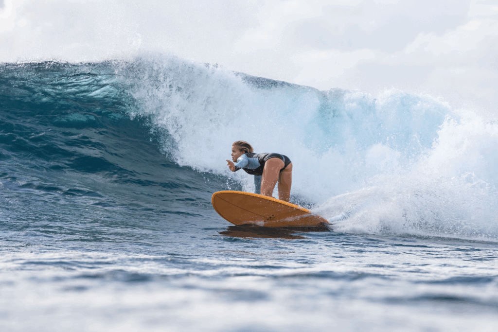 Surfing on a Torq Surfboard A girl surfing her Torq surfboard