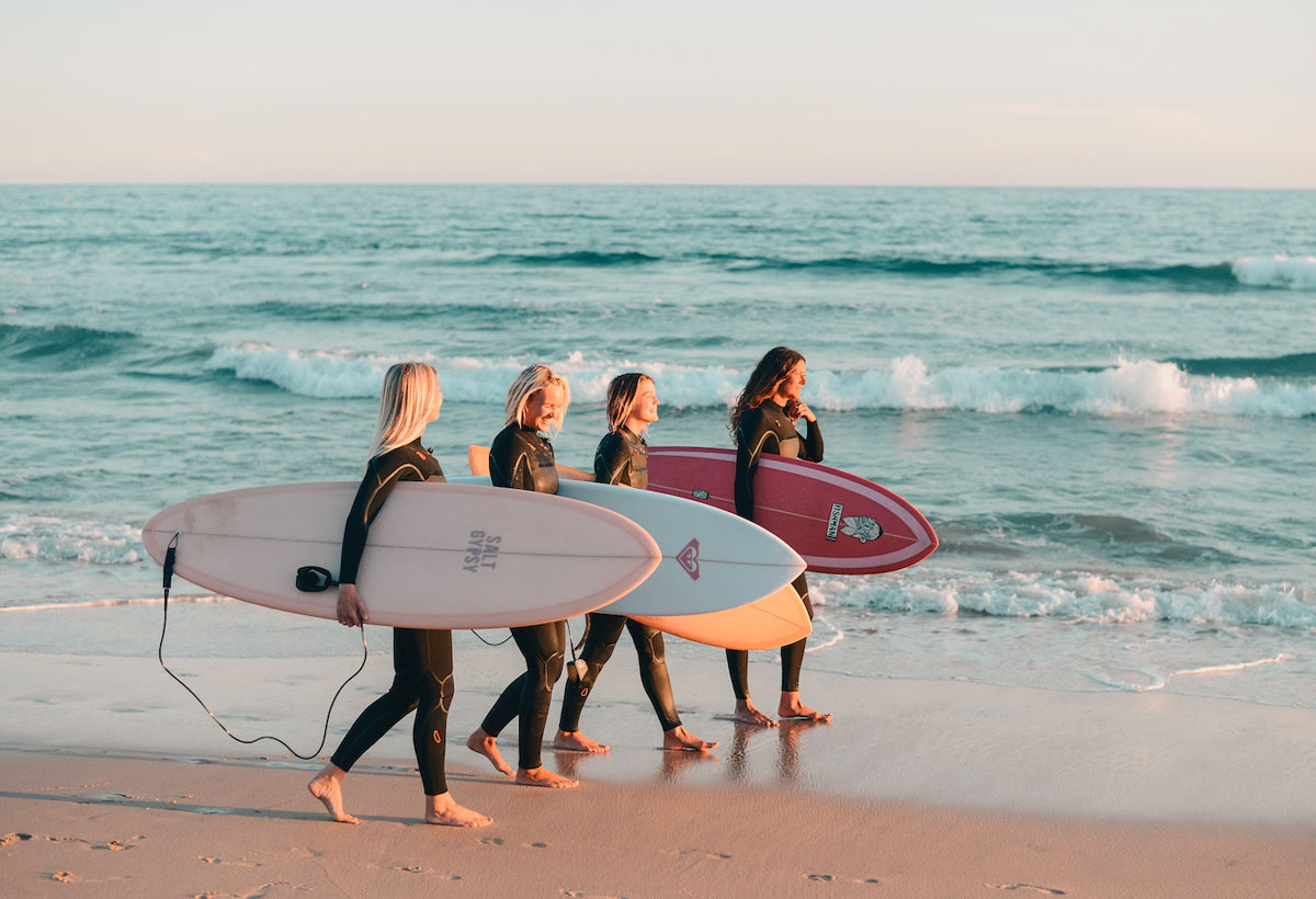 chicks-new-1200-x-820 A group photo of a group of surfers at Chicks on Waves