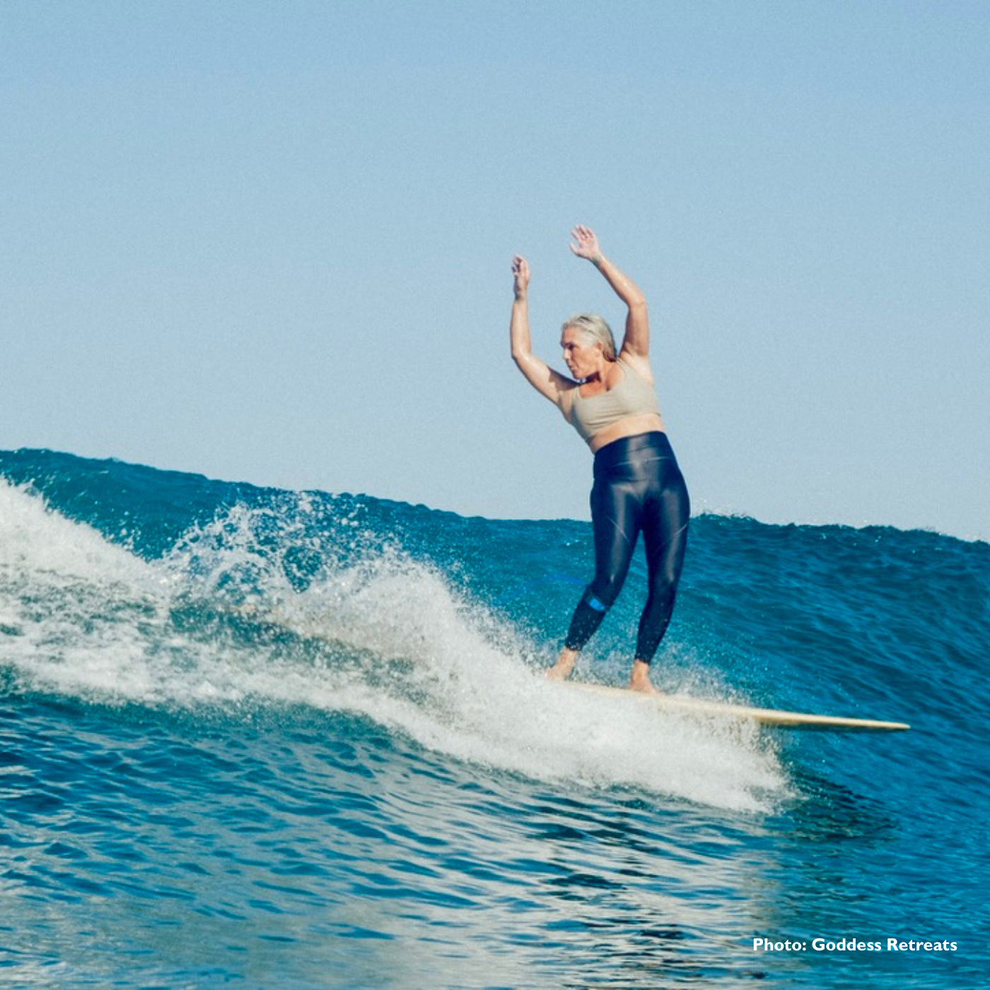 An intermediate surfer at Goddess Retreats An image to show the intermediate level when you are progressing your surfing.