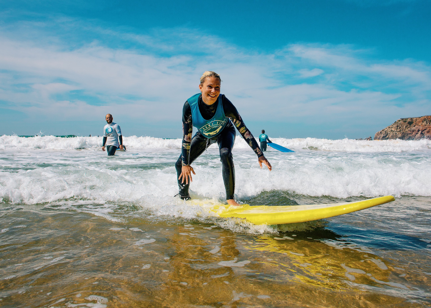 A girl surfing in Portugal with The Surf Experience A girl surfing in Portugal with The Surf Experience