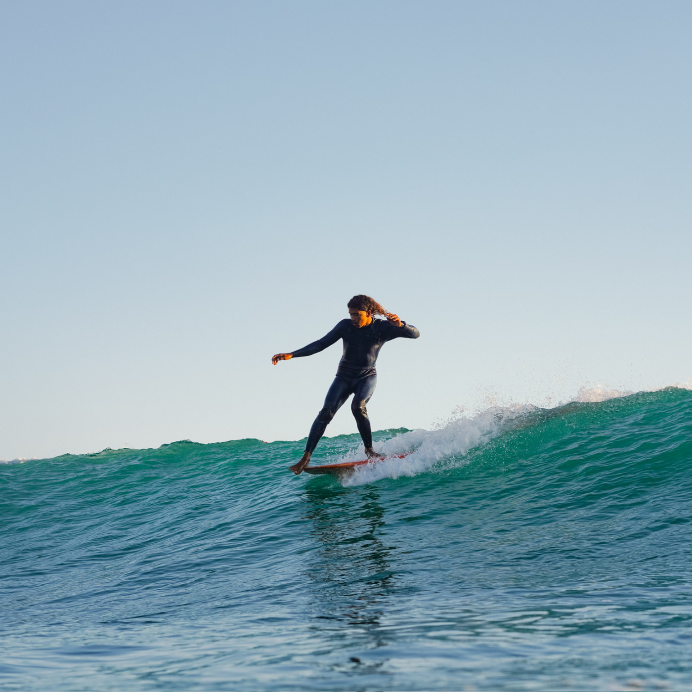 A surfer at Floating You Retreats