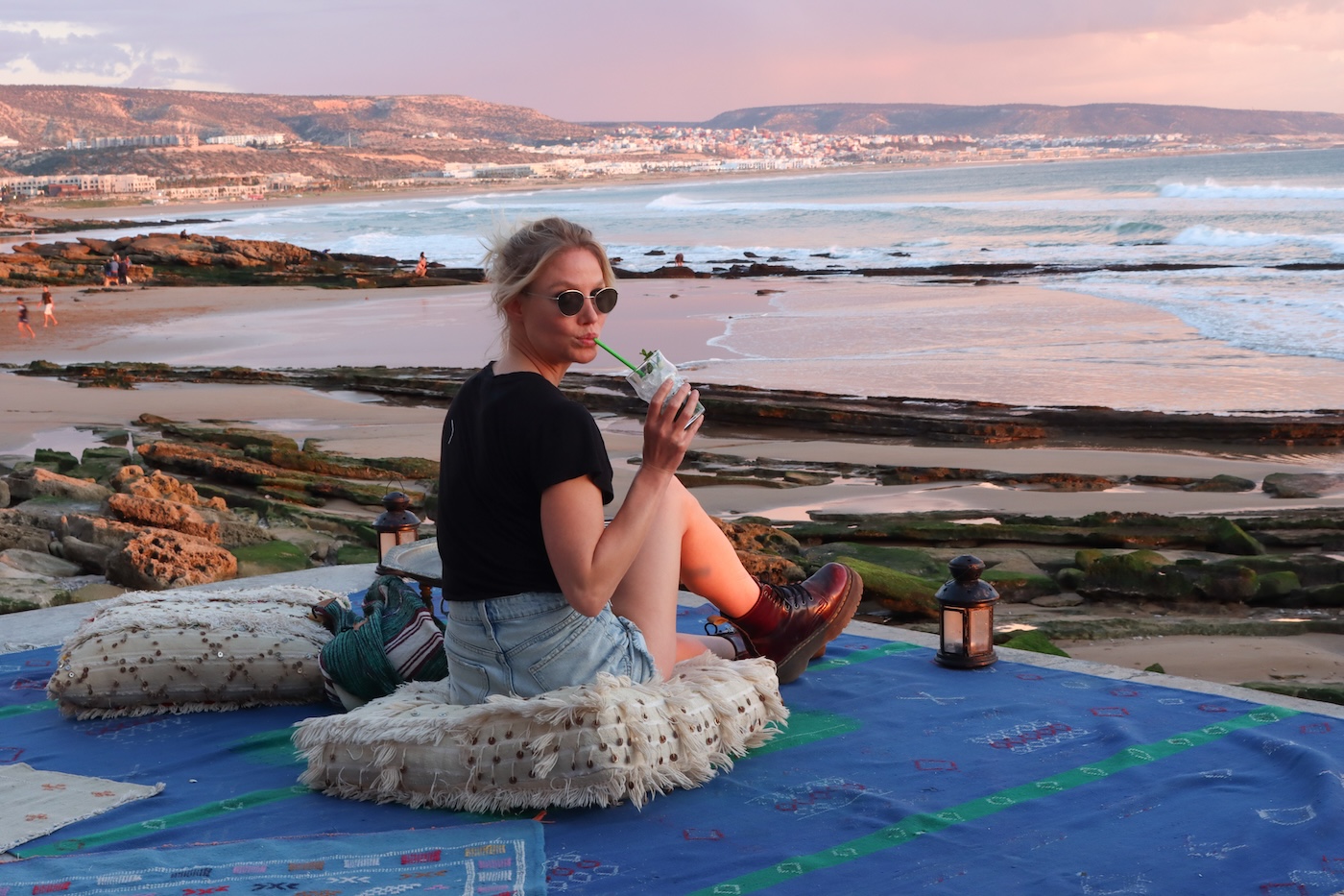 A girl drinking at Bohemian Beach Bar - Dfrost