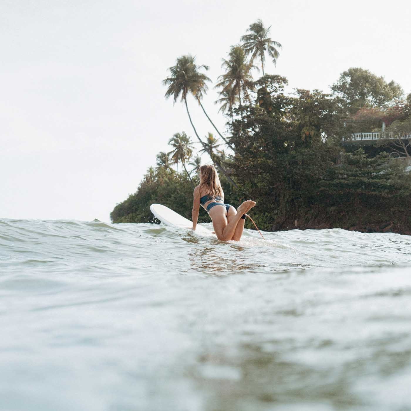 Surfing at Surf Spirit's Beach Lodge Camp in Sri Lanka