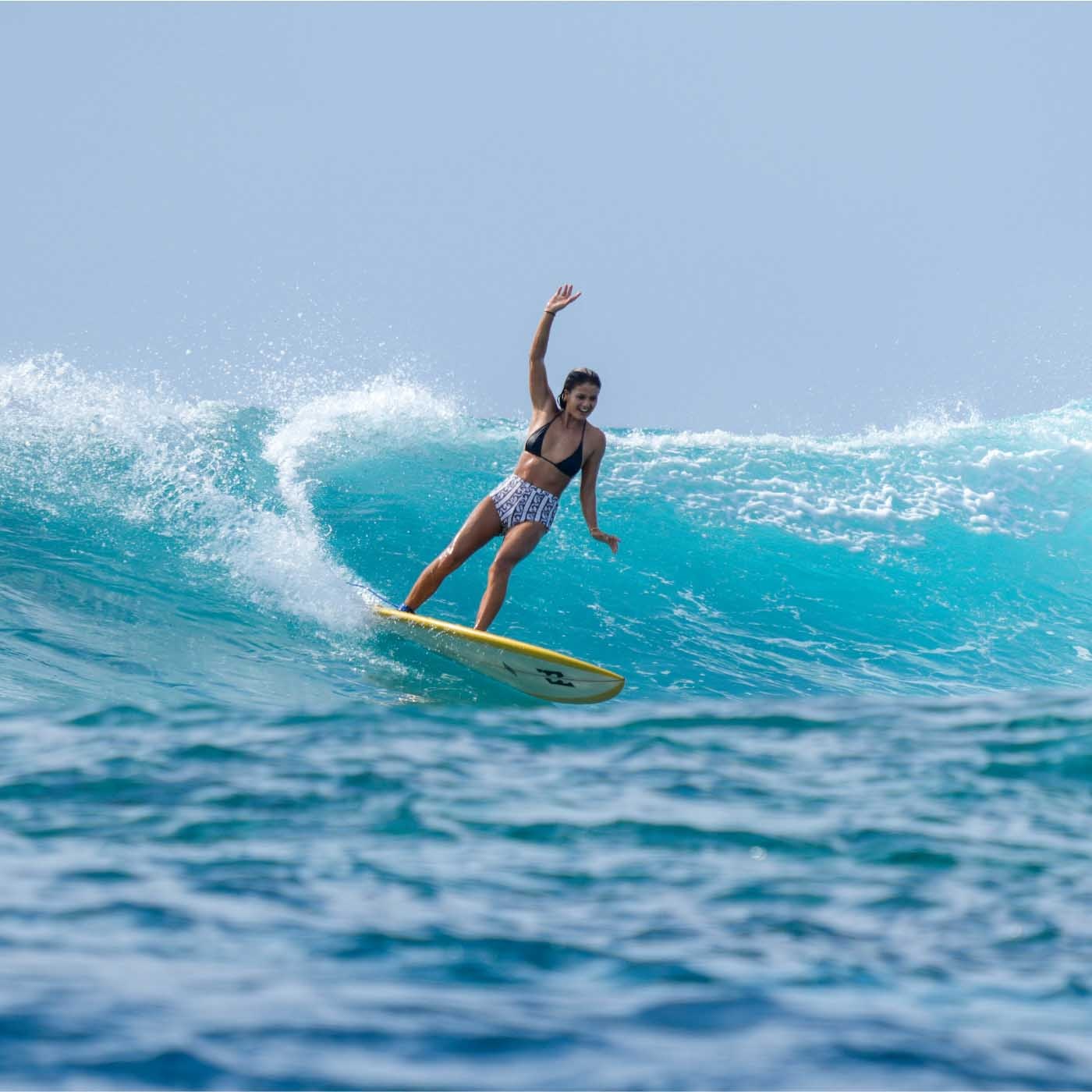 Surfing at Island Hop Maldives