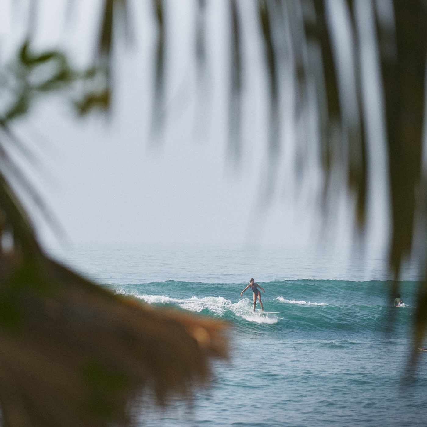 A surfer at Floating You Retreats