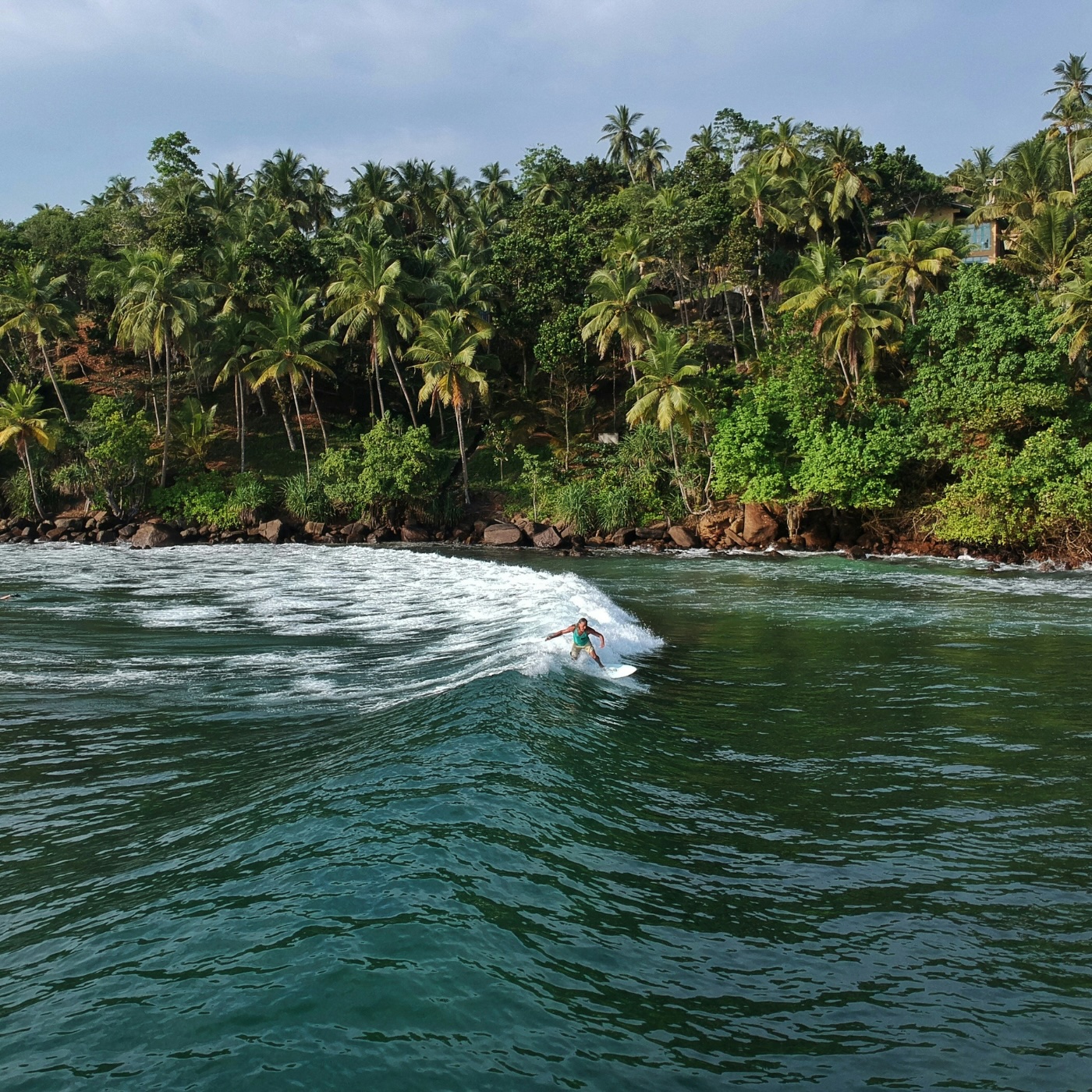 A surfer in Mirissa