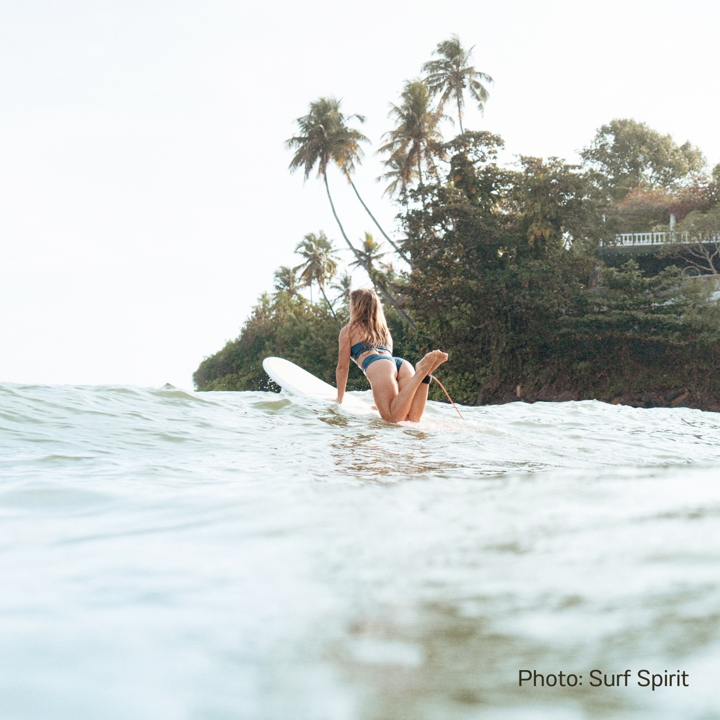 Surfing at Dewata beach in Unawatuna