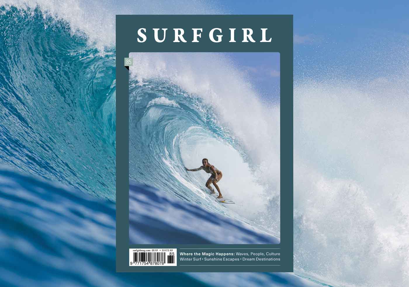 Cover of SurfGirl issue 85, showing Laura Coviella crouched inside a blue barrel, set against a wider shot of the same breaking wave