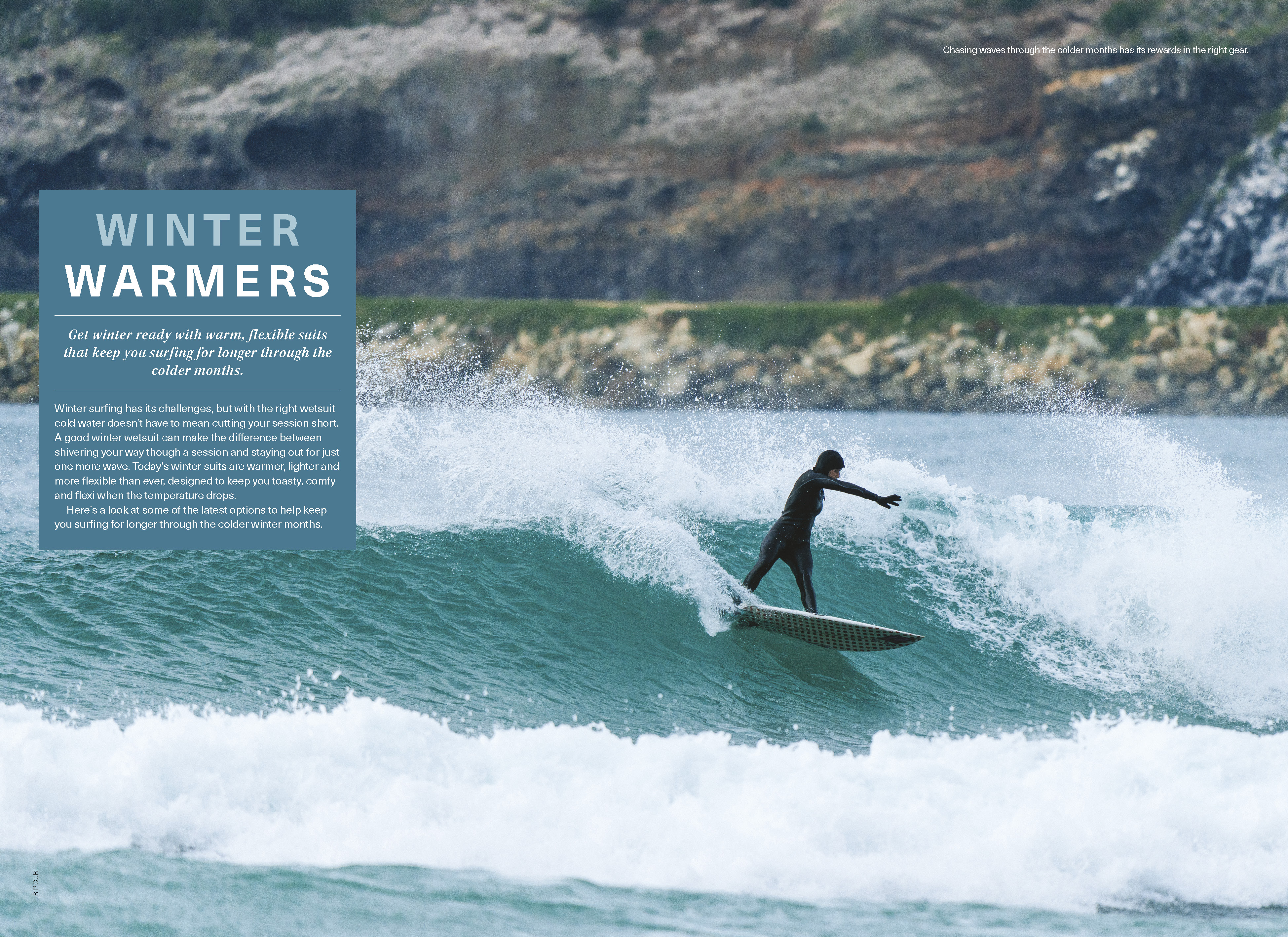 Magazine spread of a surfer in a hooded winter wetsuit carving a teal wave beneath rocky cliffs, with a blue Winter Warmers text panel