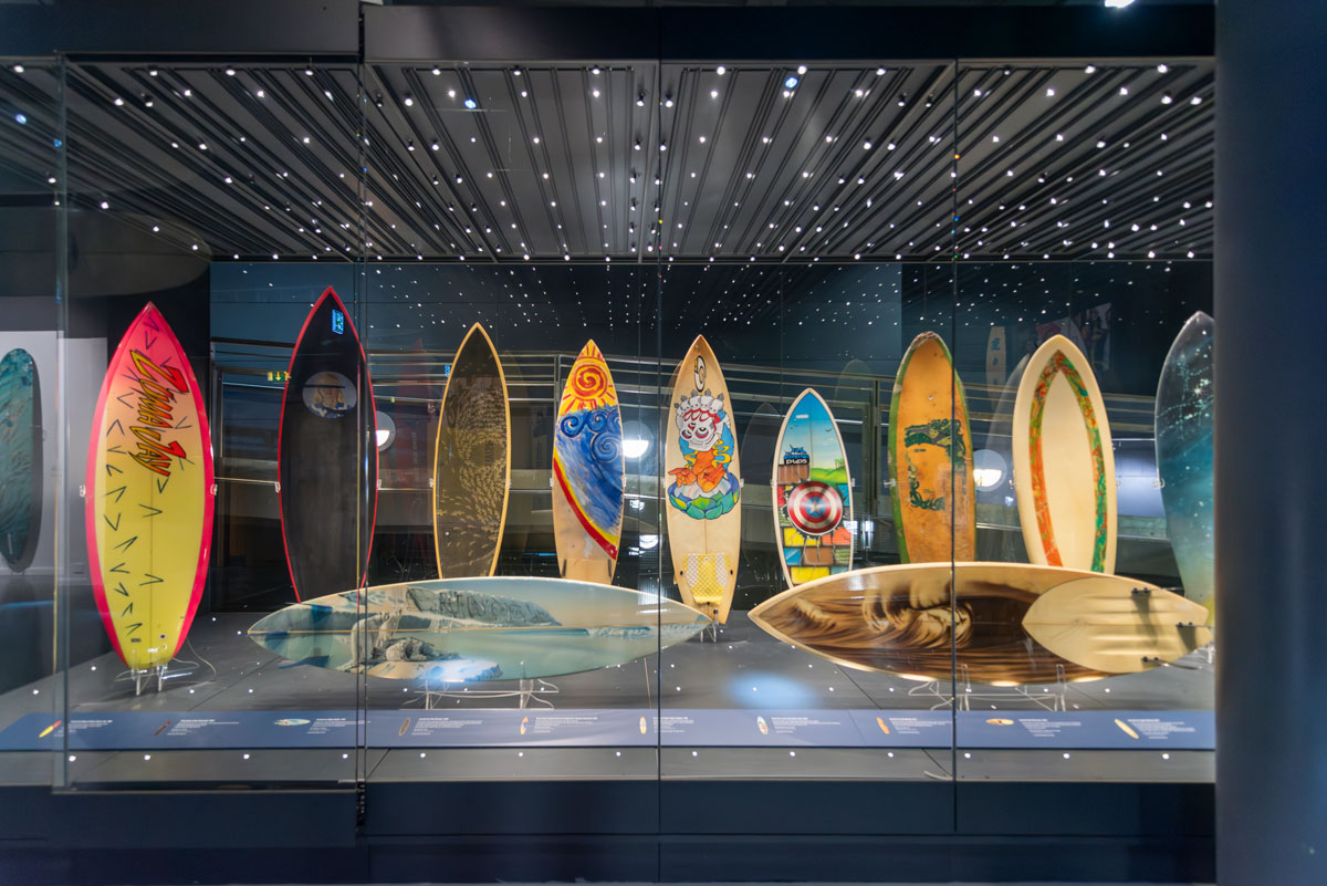 Classic surfboards and sprays on display in the SURF! exhibition at the National Maritime Museum Cornwall